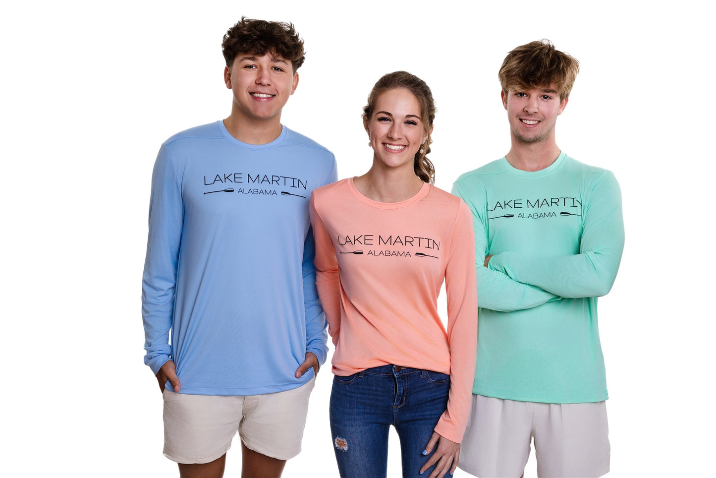 Two men and a woman wearing Lakemartin clothing
